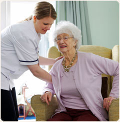 women being helped to sitting position